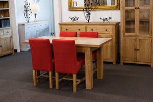 Extending Dining Table with 4 Red Dining Chairs