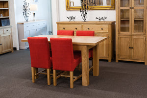 Extending Dining Table with 4 Red Dining Chairs