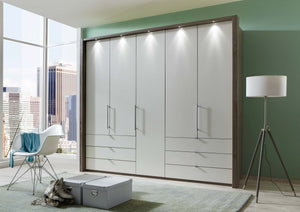 Wiemann Loft Bi-Fold Panorama Door Wardrobe with Drawers | A Touch of Furniture